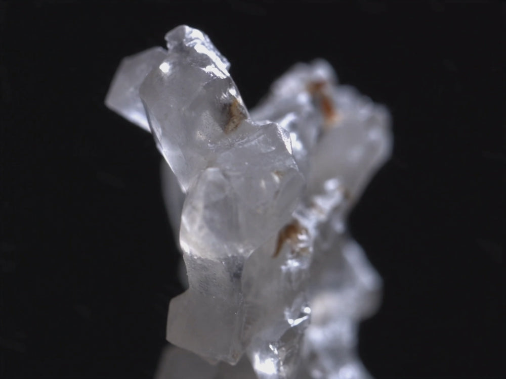 Magnesium dissolving in water, filmed close up